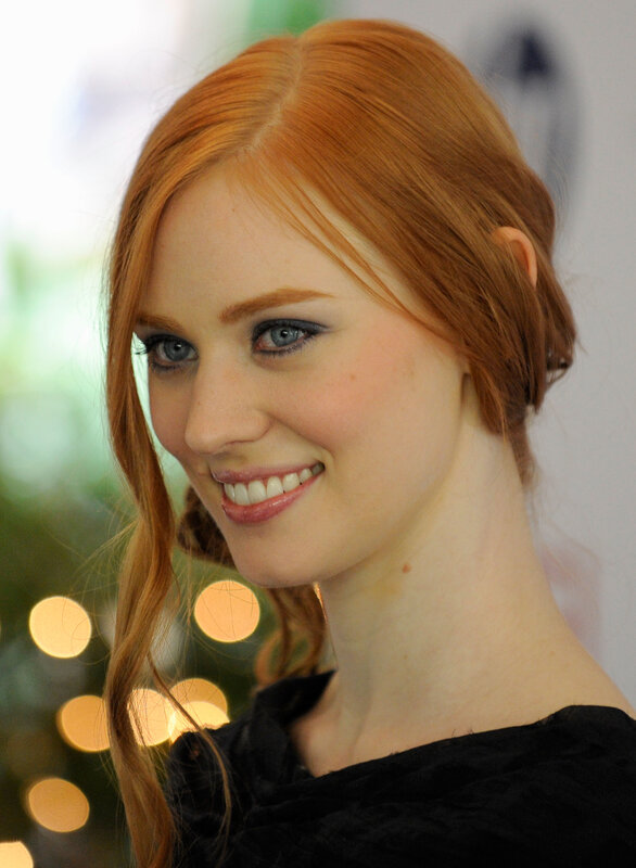 red-haired woman smiling