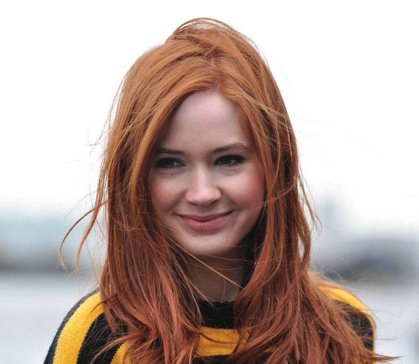 red-haired woman smiling