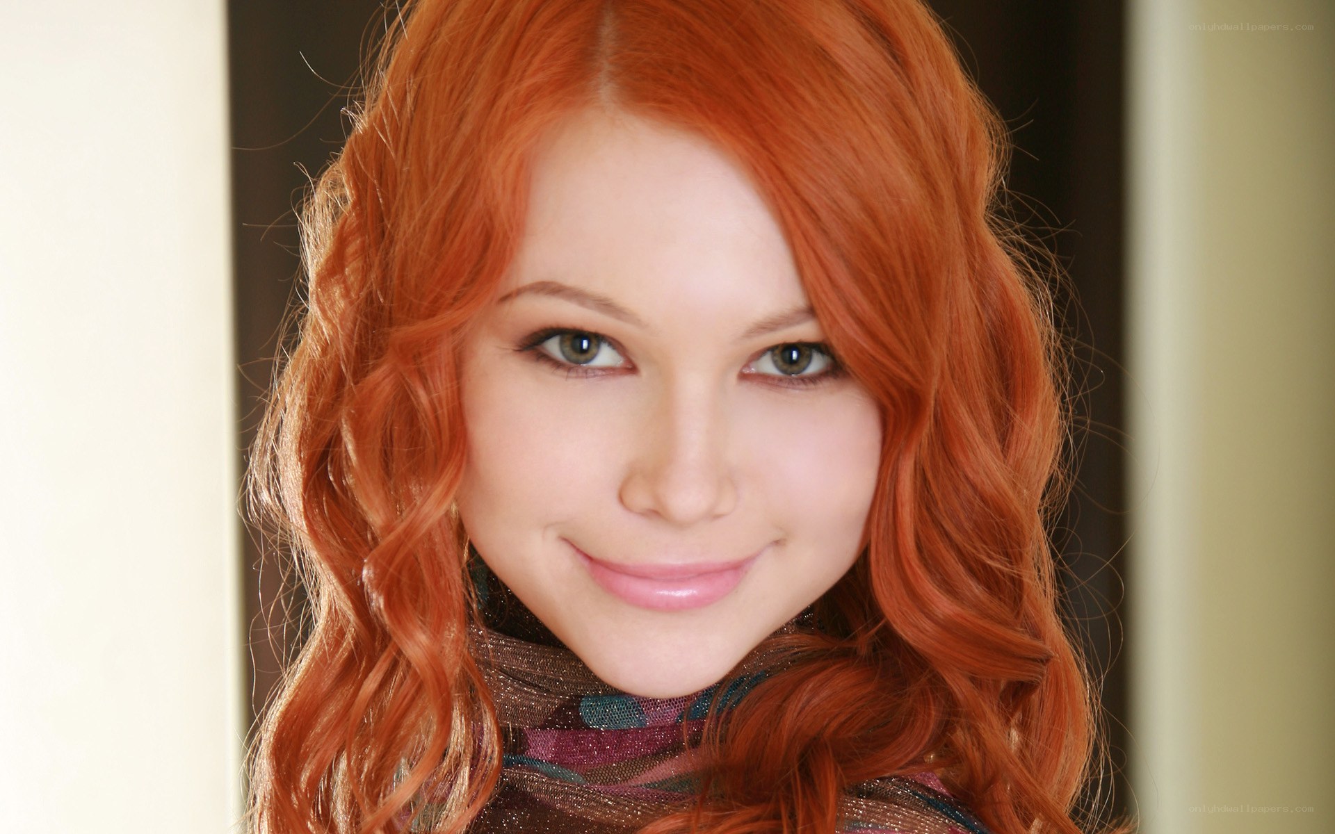 red-haired woman smiling
