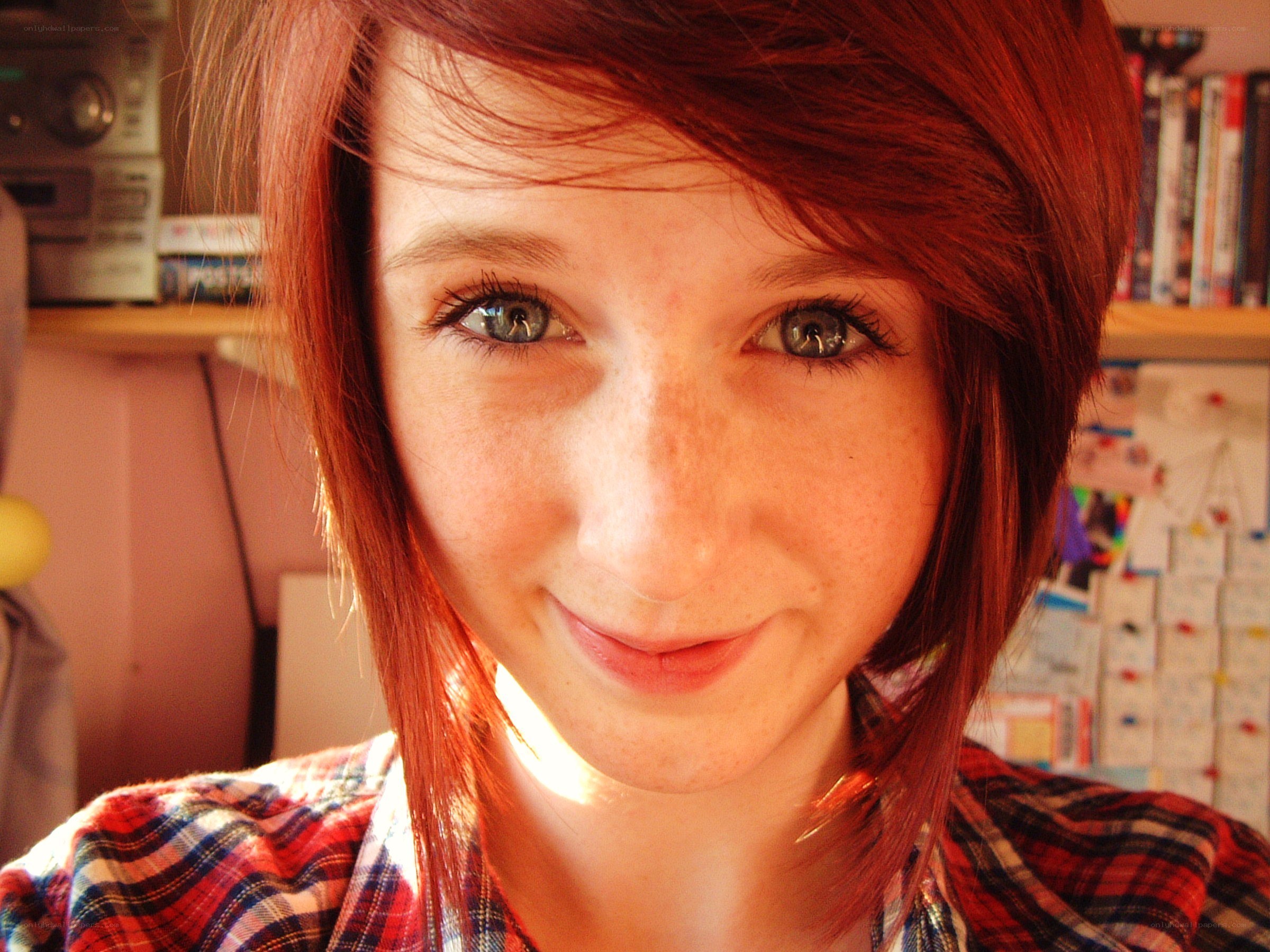 red-haired woman smiling