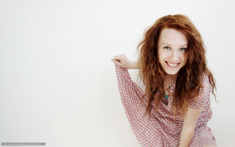 red-haired woman smiling