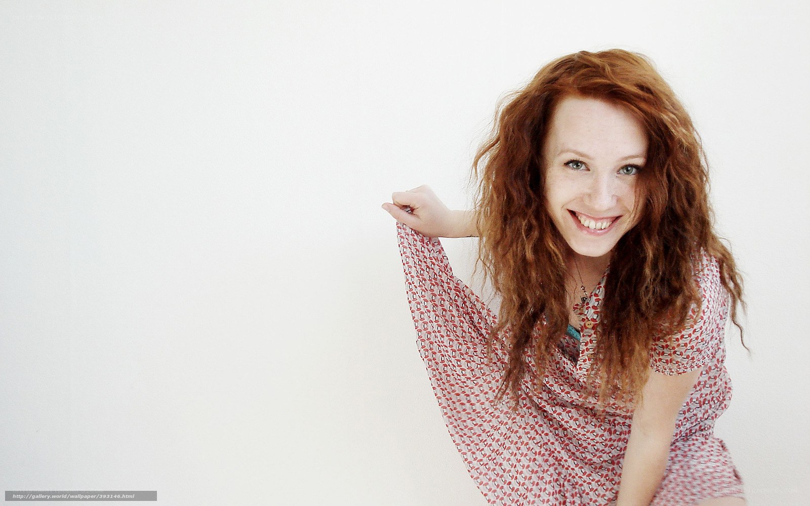 red-haired woman smiling