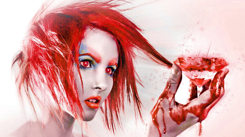 red-haired woman with bloodied hand