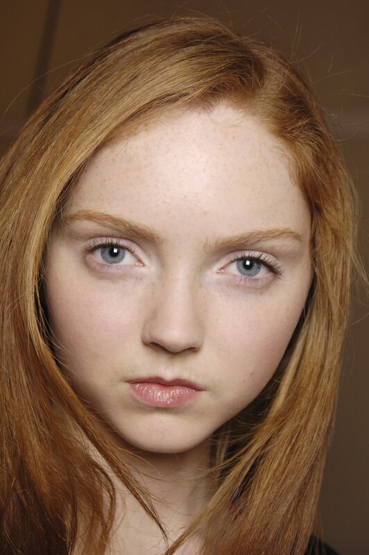 red-haired woman with blue eyes