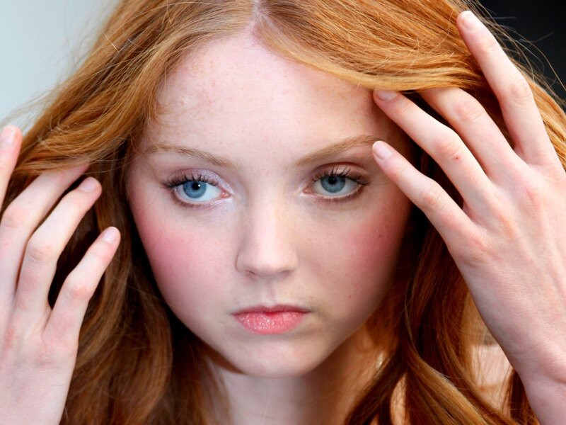 red-haired woman with blue eyes