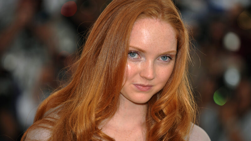 red-haired woman with blue eyes