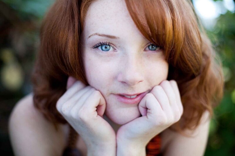 red-haired woman with blue eyes