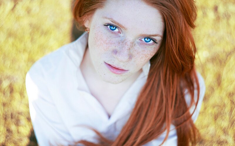 red-haired woman with blue eyes