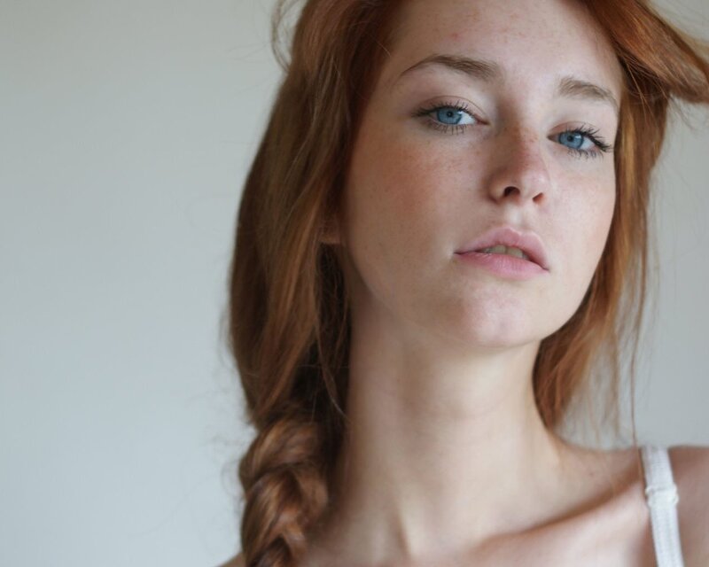 red-haired woman with blue eyes