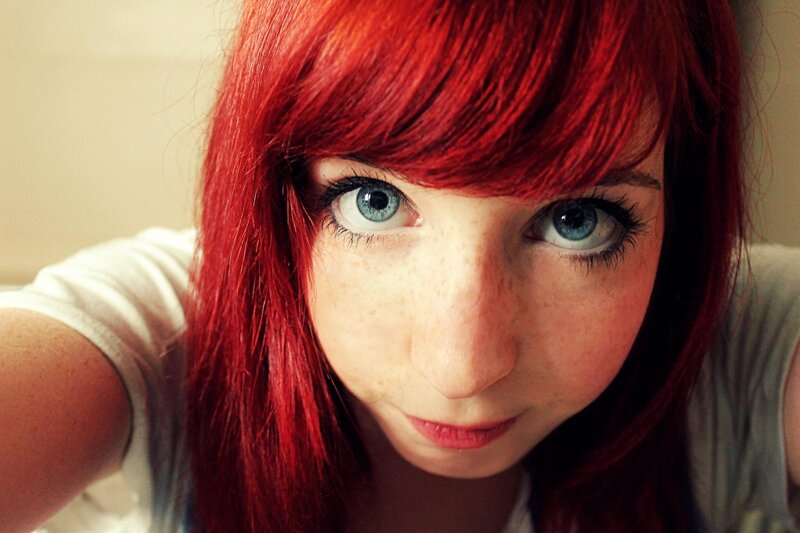 red-haired woman with blue eyes