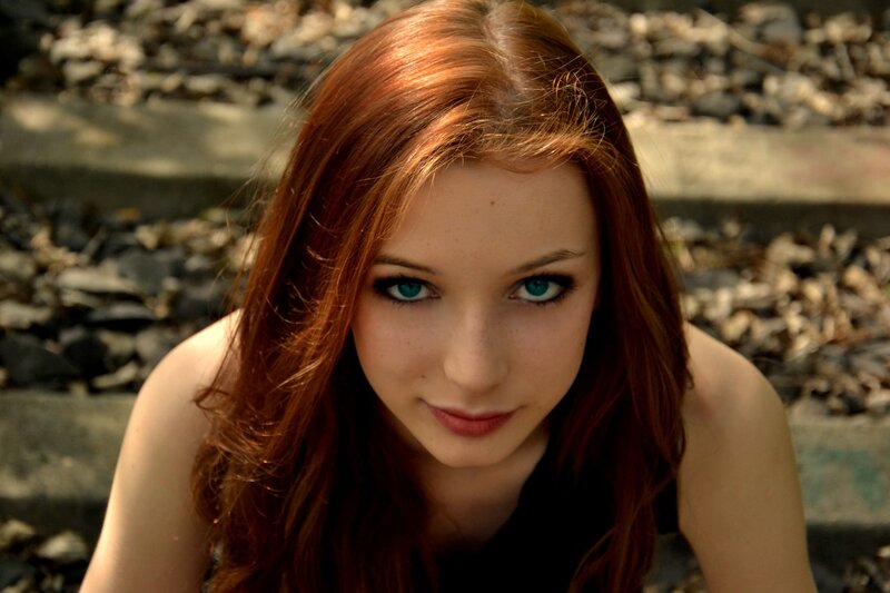 red-haired woman with blue eyes
