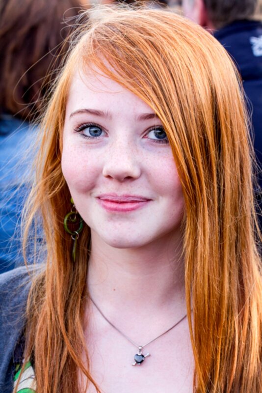 red-haired woman with blue eyes