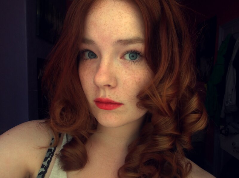 red-haired woman with blue eyes