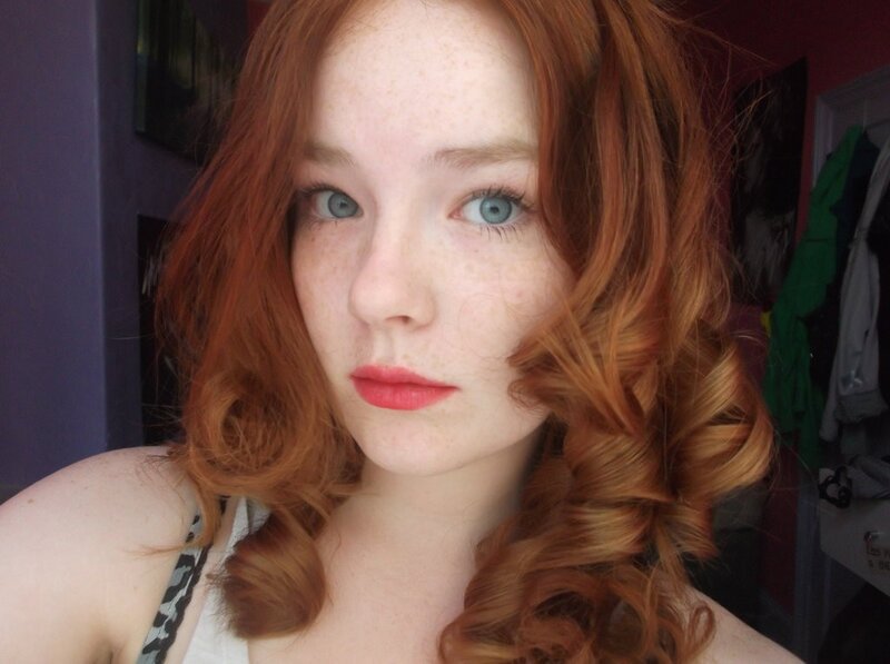 red-haired woman with blue eyes