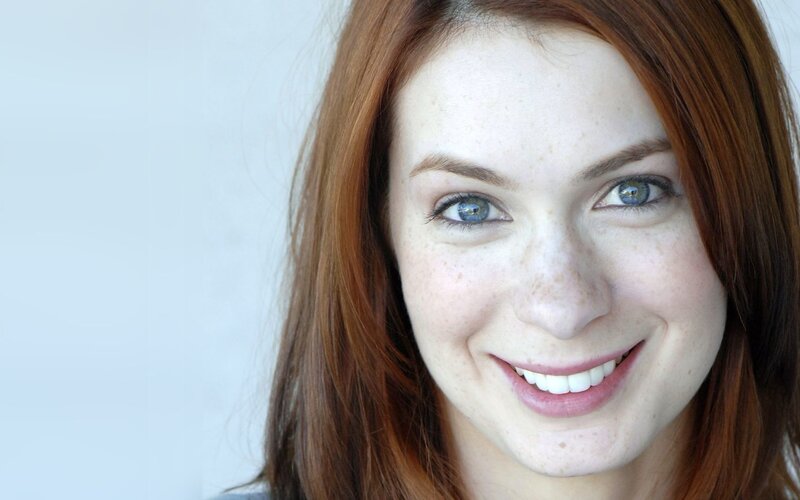 red-haired woman with blue eyes