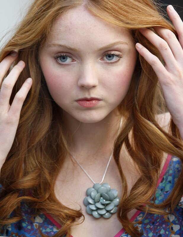 red-haired woman with blue eyes