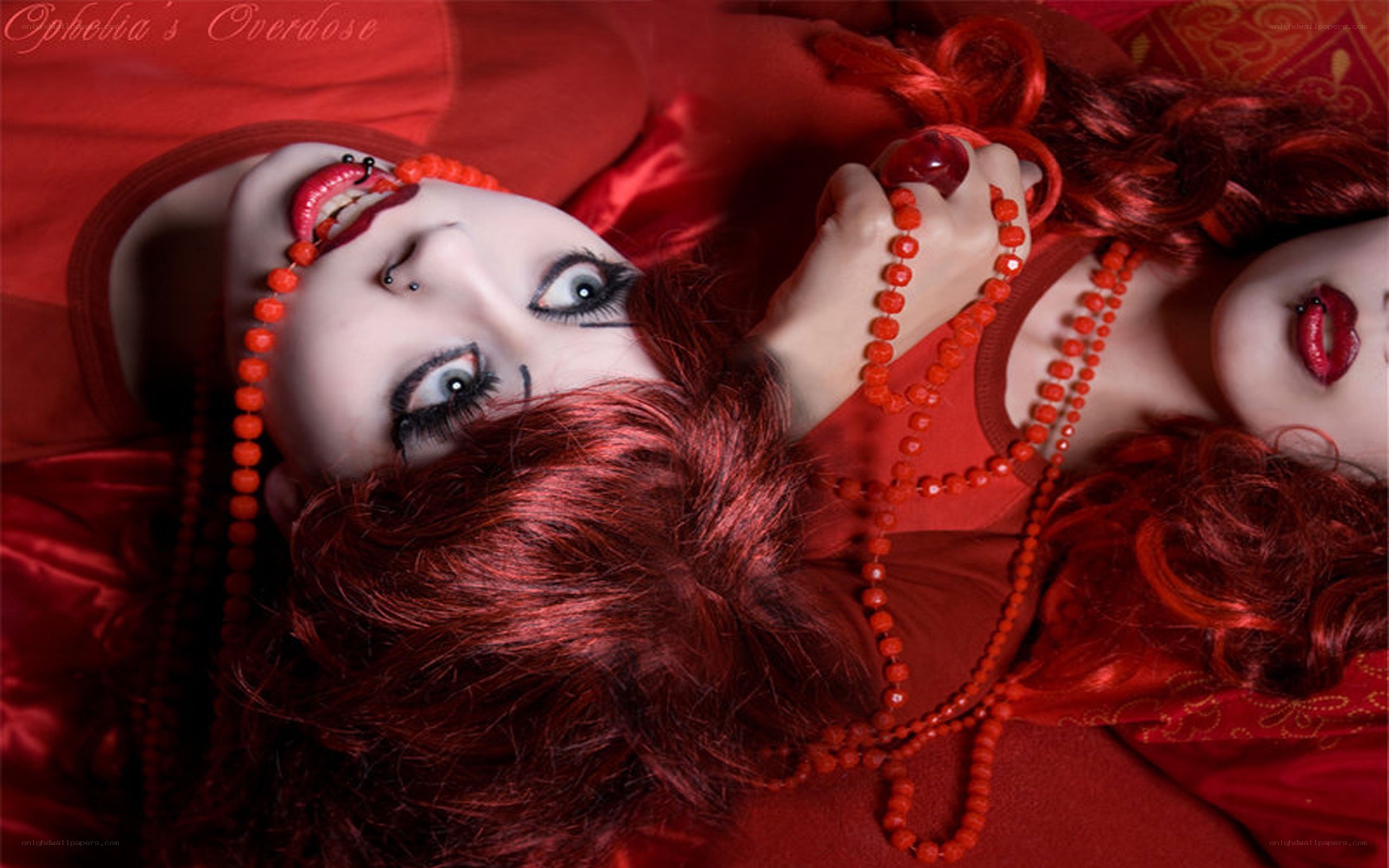 Red-haired woman with dramatic makeup