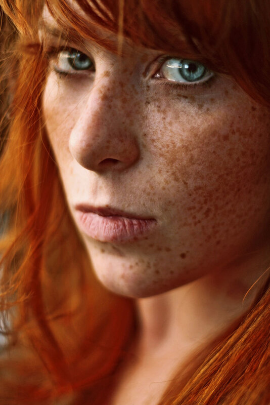 red-haired woman with freckles