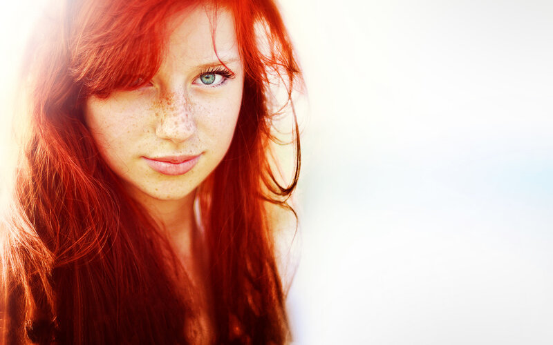 red-haired woman with freckles