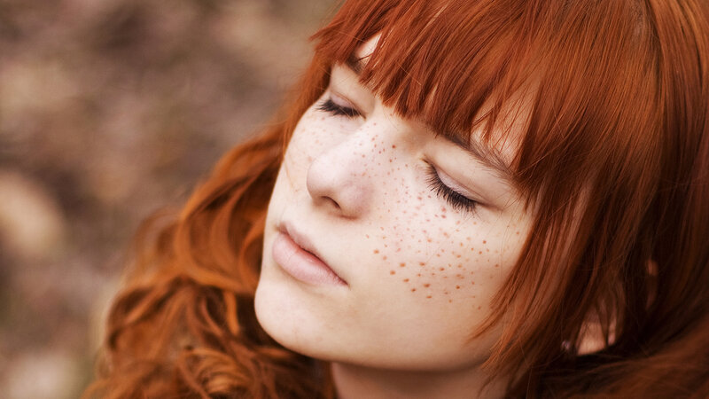 red-haired woman with freckles