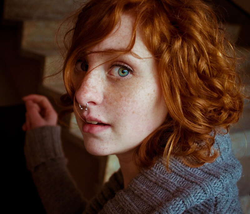 red-haired woman with freckles