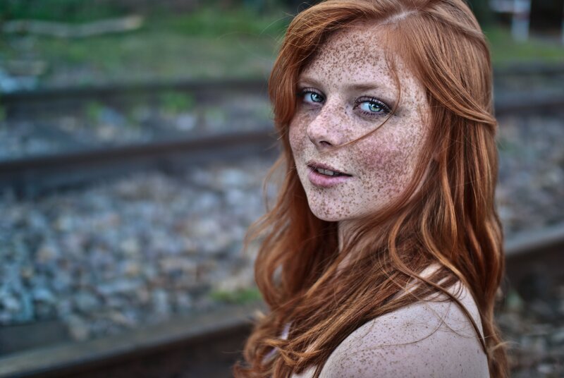 Red-haired woman with freckles