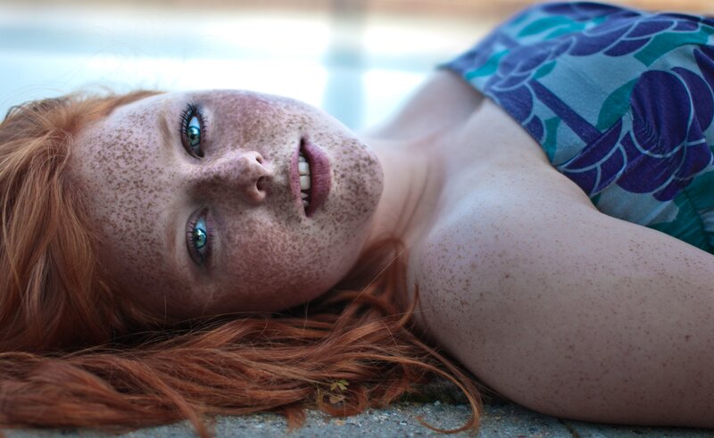 Red-haired woman with freckles