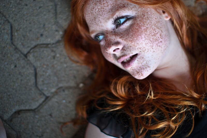 red-haired woman with freckles