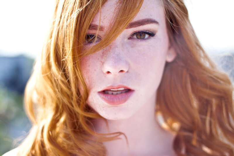 red-haired woman with freckles