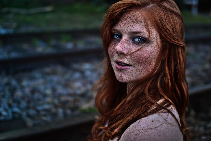 red-haired woman with freckles
