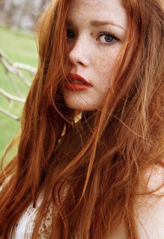 red-haired woman with freckles