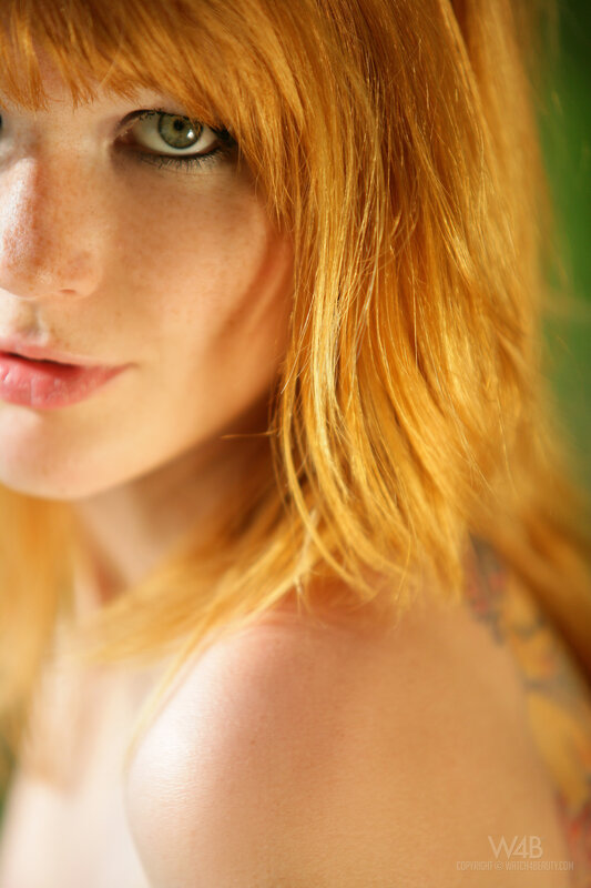 red-haired woman with freckles