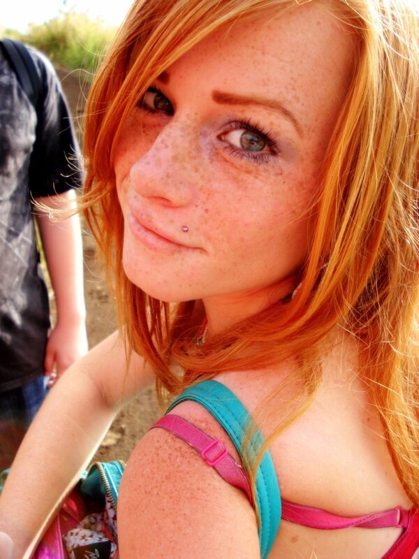 Red-haired woman with freckles