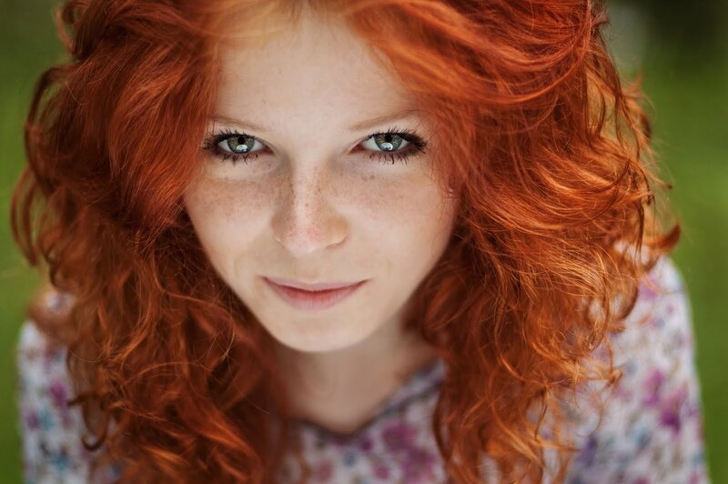 red-haired woman with freckles