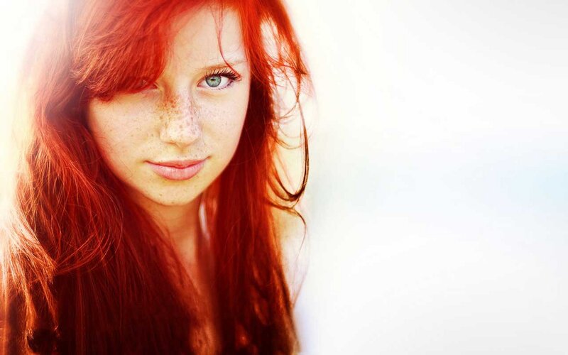 red-haired woman with freckles