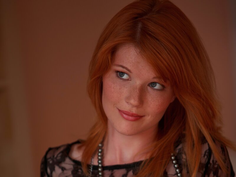 Red-haired woman with freckles