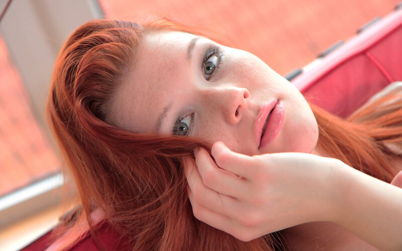 red-haired woman with freckles