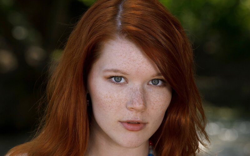 red-haired woman with freckles
