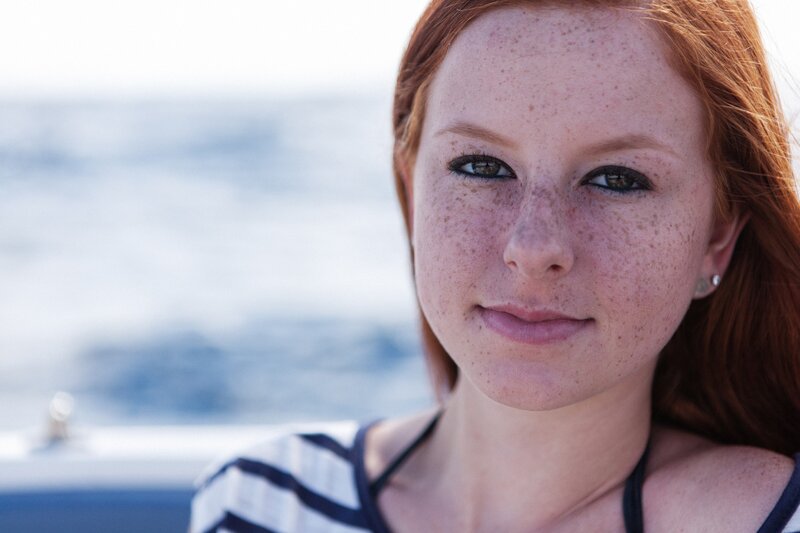 red-haired woman with freckles