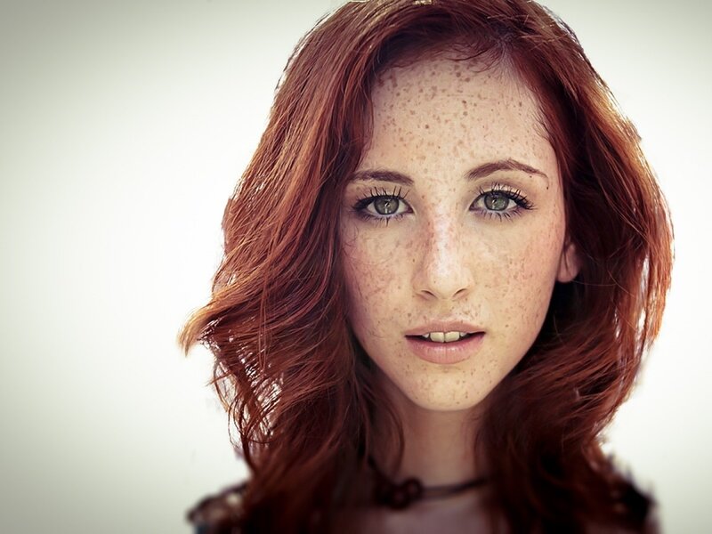 red-haired woman with freckles