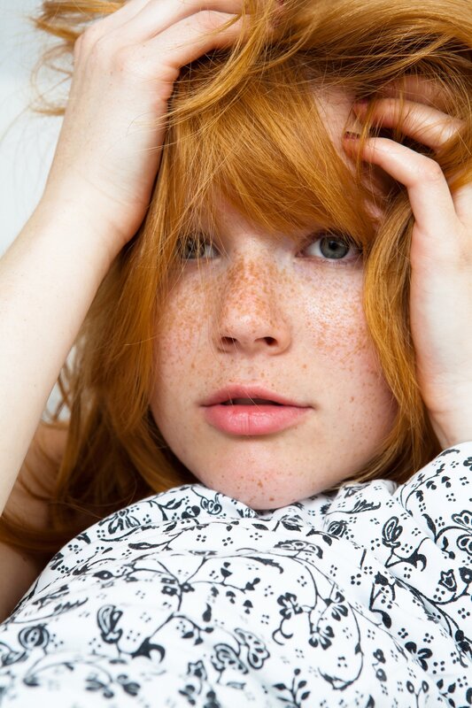 red-haired woman with freckles