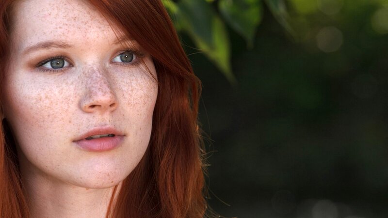 red-haired woman with freckles