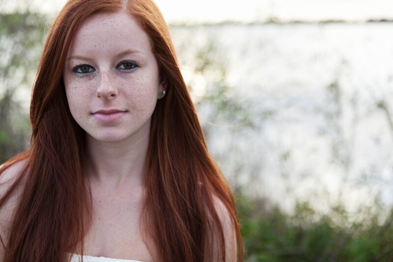 Red-haired woman with freckles