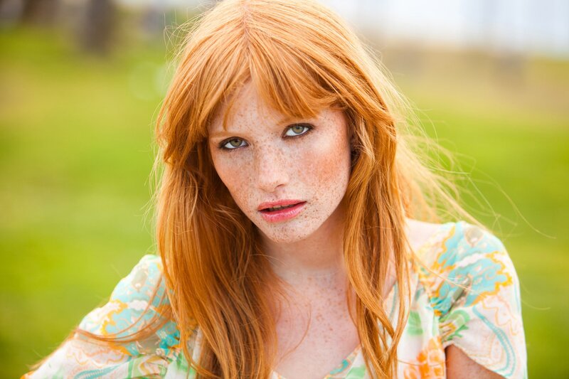 red-haired woman with freckles