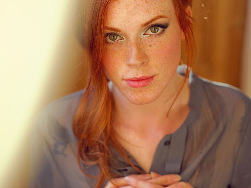 Red-haired woman with freckles