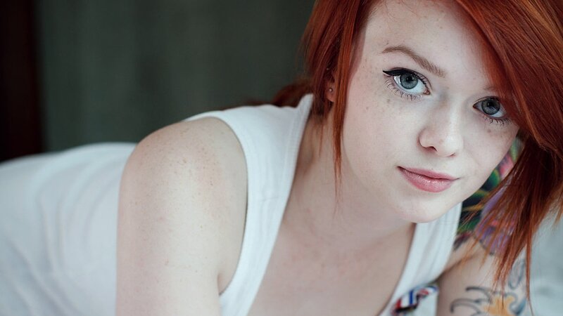 red-haired woman with freckles