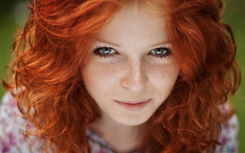 red-haired woman with freckles
