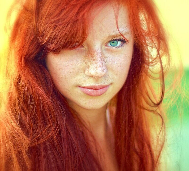 red-haired woman with freckles