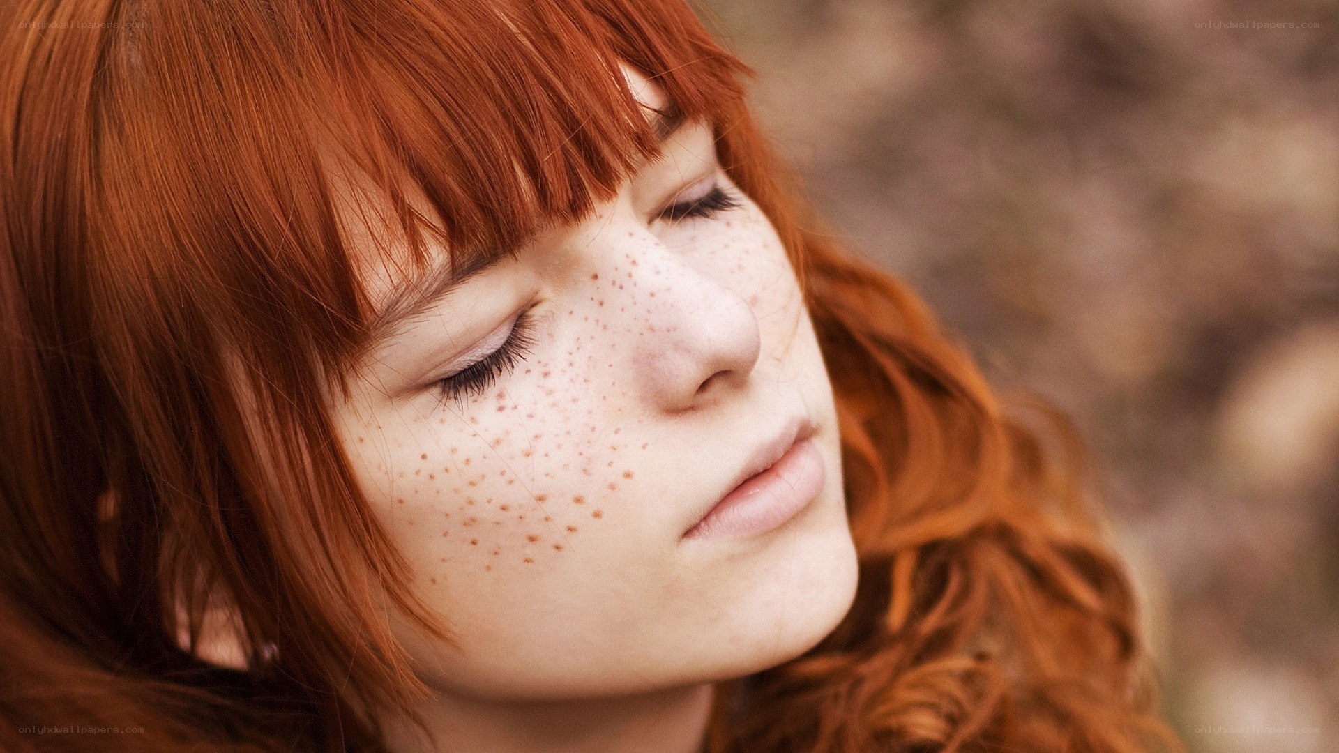 red-haired woman with freckles