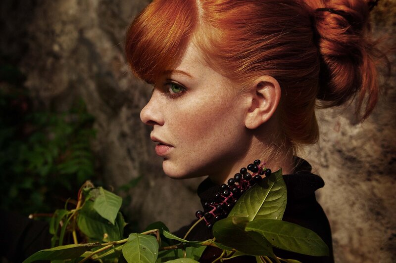 red-haired woman with green eyes